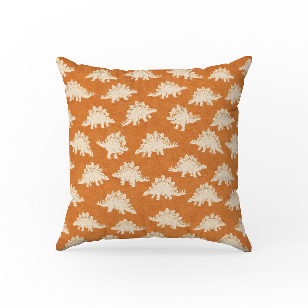 Stegosaurus Parade – Burnt Orange Dinosaur Pillow